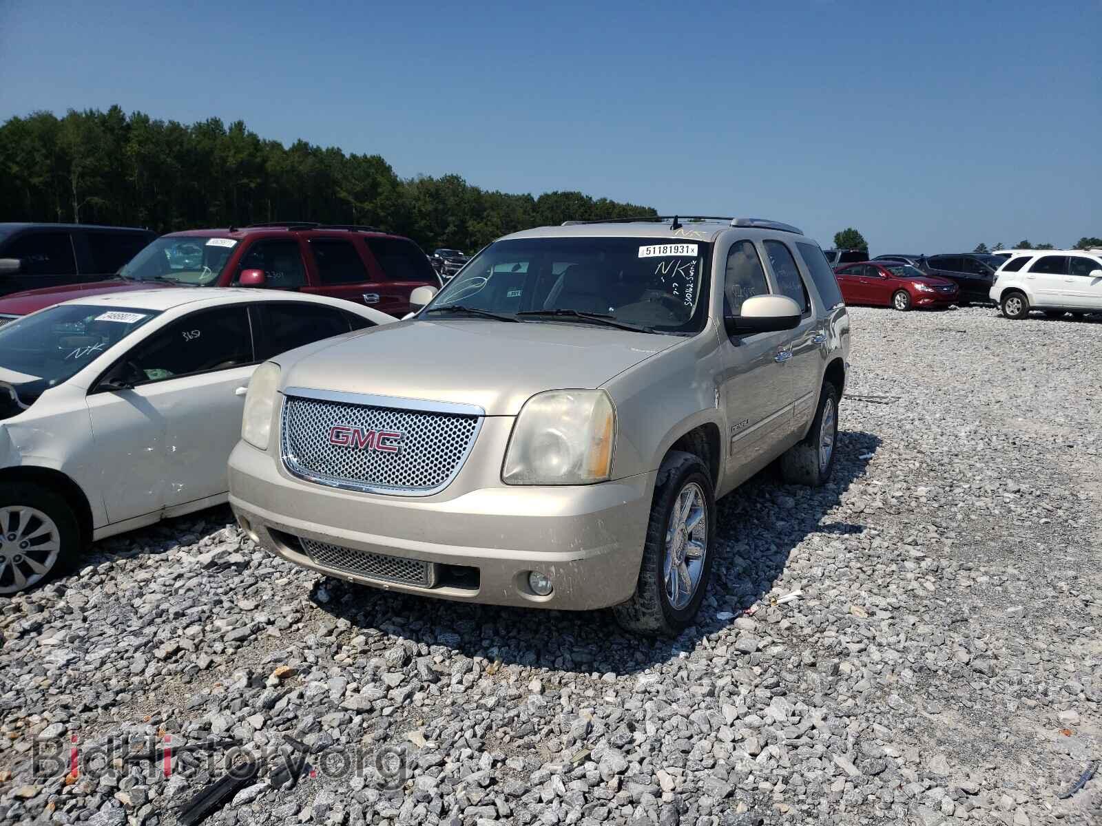 2011 GMC YUKON - VIN: 1GKS1EEF8BR374438 - Фото 2