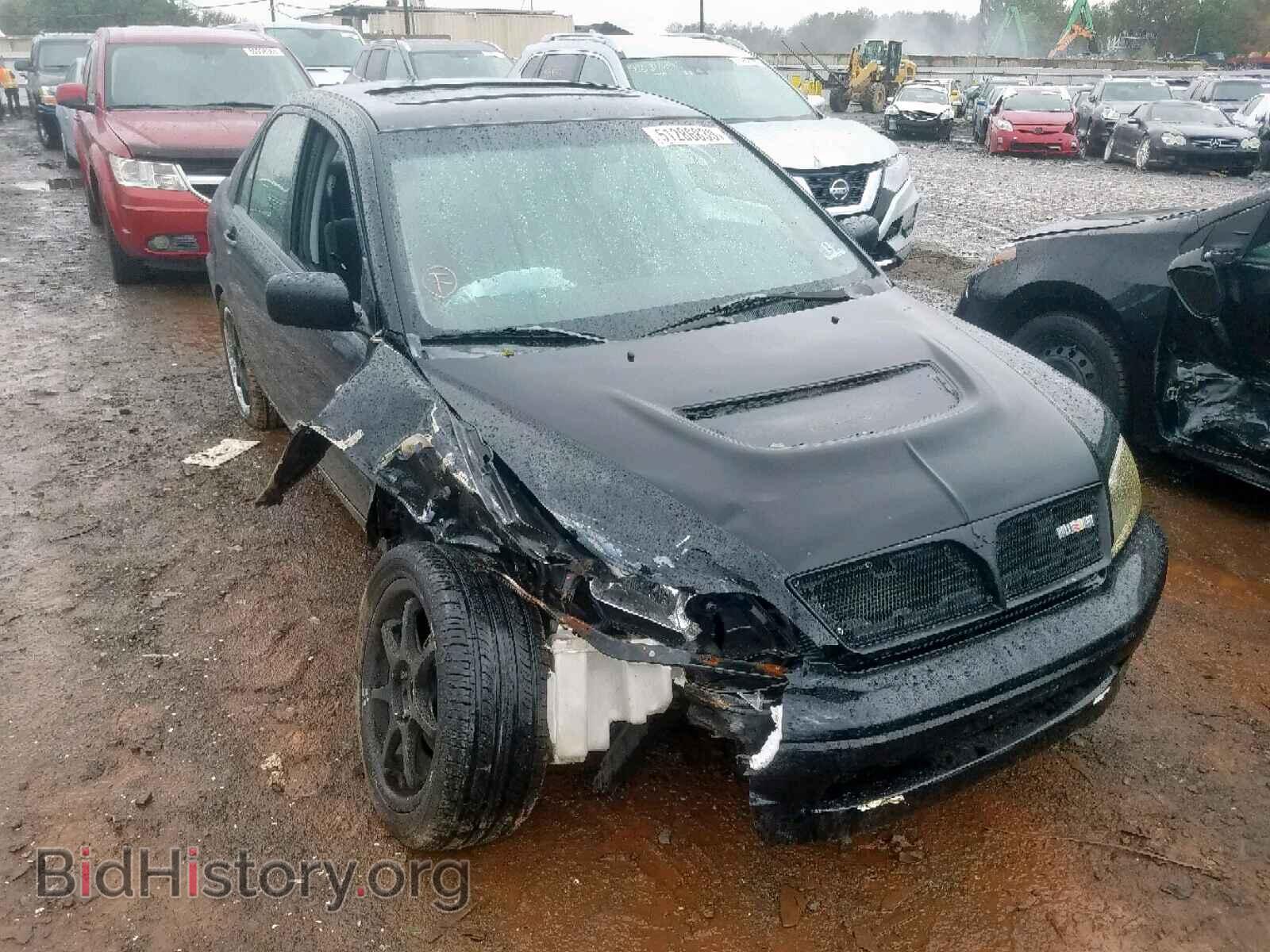 Photo JA3AJ86E33U010911 - MITSUBISHI LANCER 2003