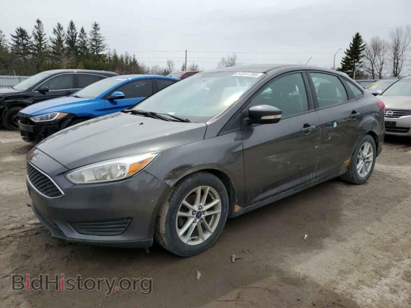 2015 Ford FOCUS SE (VIN 1FADP3F22FL358978) — фото 1 из 12, Copart, повреждение: бок