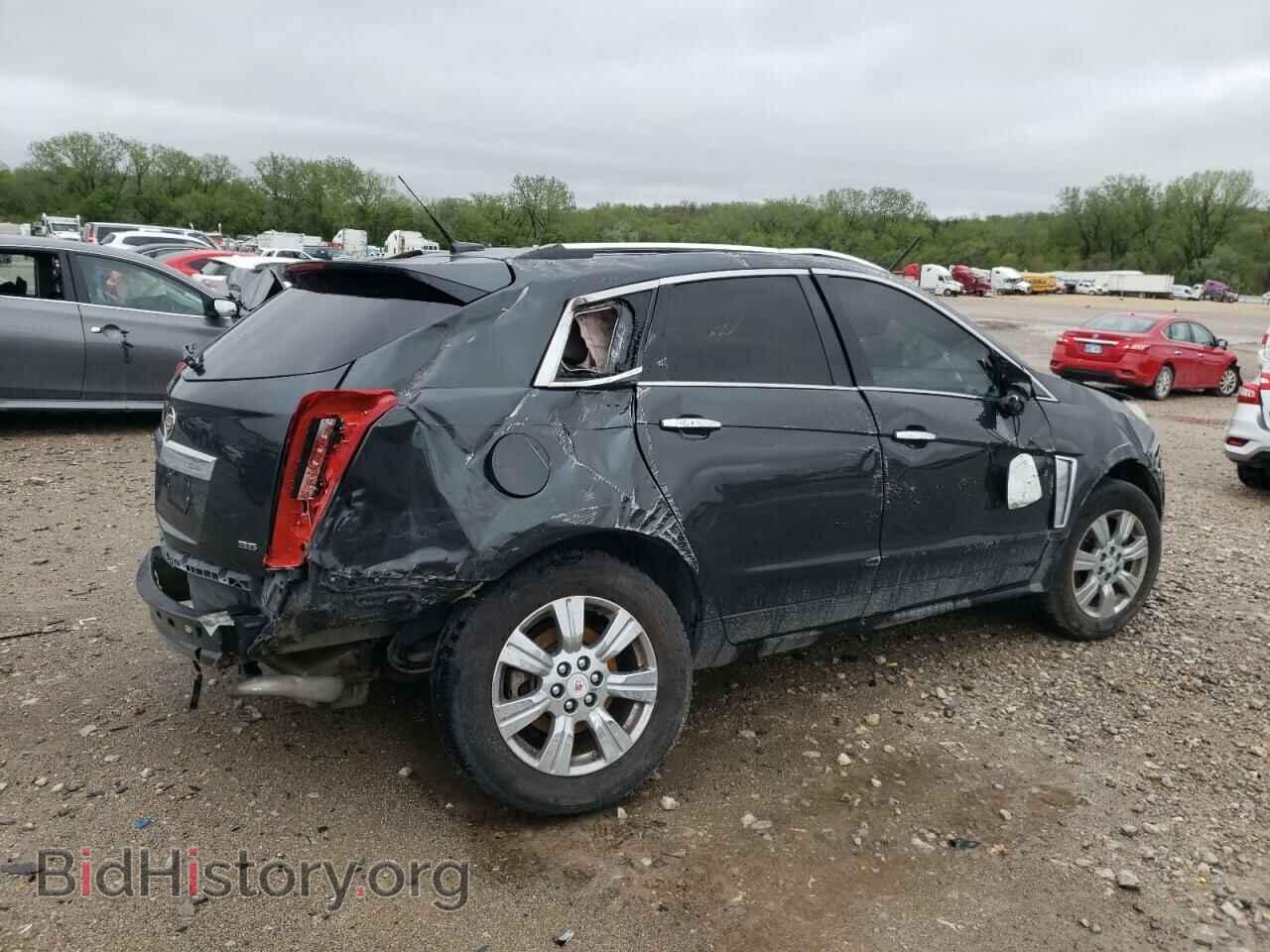 2014 CADILLAC SRX - VIN: 3GYFNEE35ES662968 - Фото 3