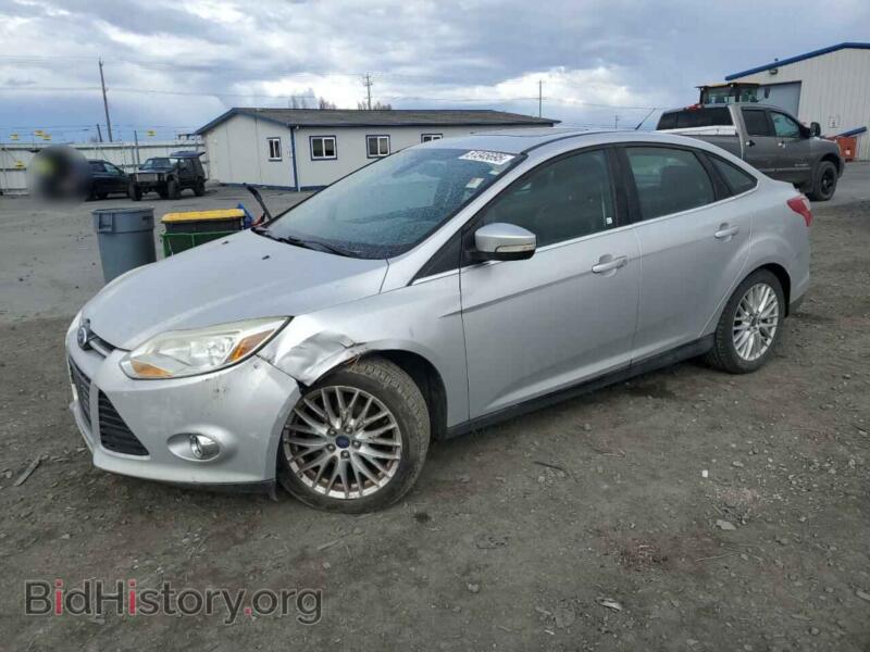 2012 Ford FOCUS SEL (VIN 1FAHP3H24CL453391) — photo 1 of 14, Copart, damage: front end