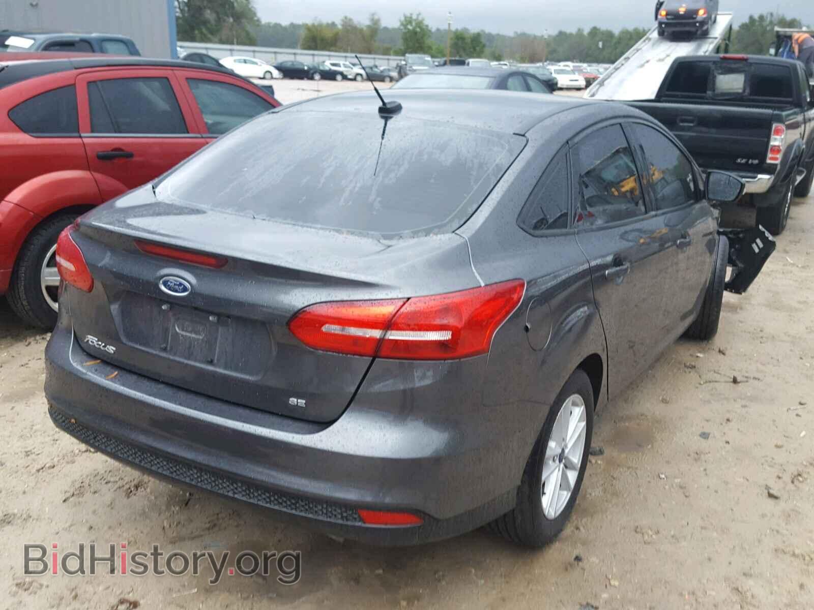 2017 FORD FOCUS - VIN: 1FADP3F21HL297819 - Photo 4