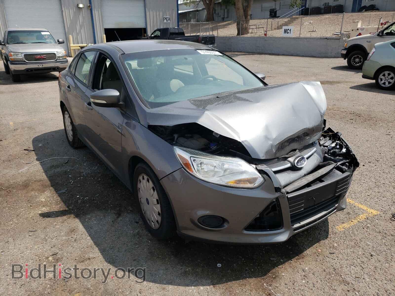 Фотография 1FADP3F25DL340200 - FORD FOCUS 2013
