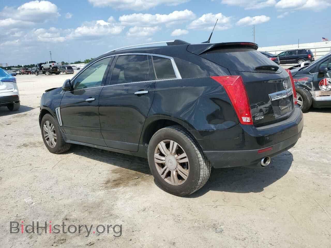 2014 CADILLAC SRX - VIN: 3GYFNBE38ES687202 - Фото 2