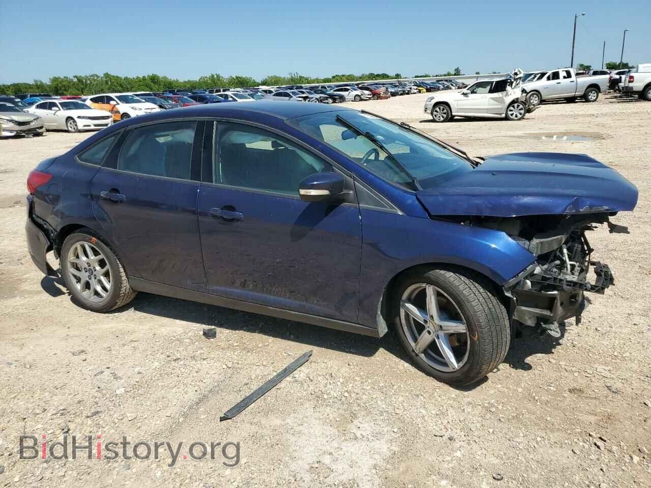 2016 FORD FOCUS - VIN: 1FADP3F20GL310381 - Photo 4