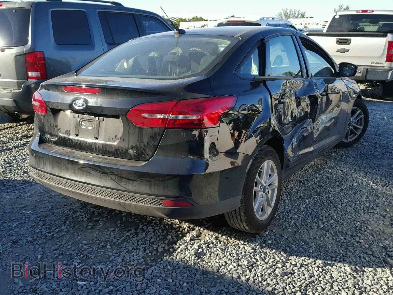 2017 FORD FOCUS - VIN: 1FADP3F20HL322662 - Photo 4