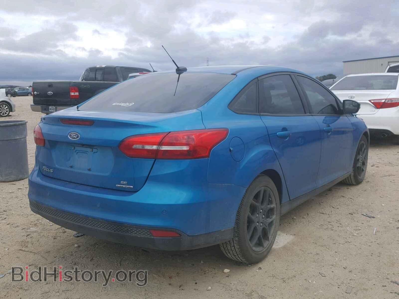 2016 FORD FOCUS - VIN: 1FADP3F22GL374390 - Photo 4