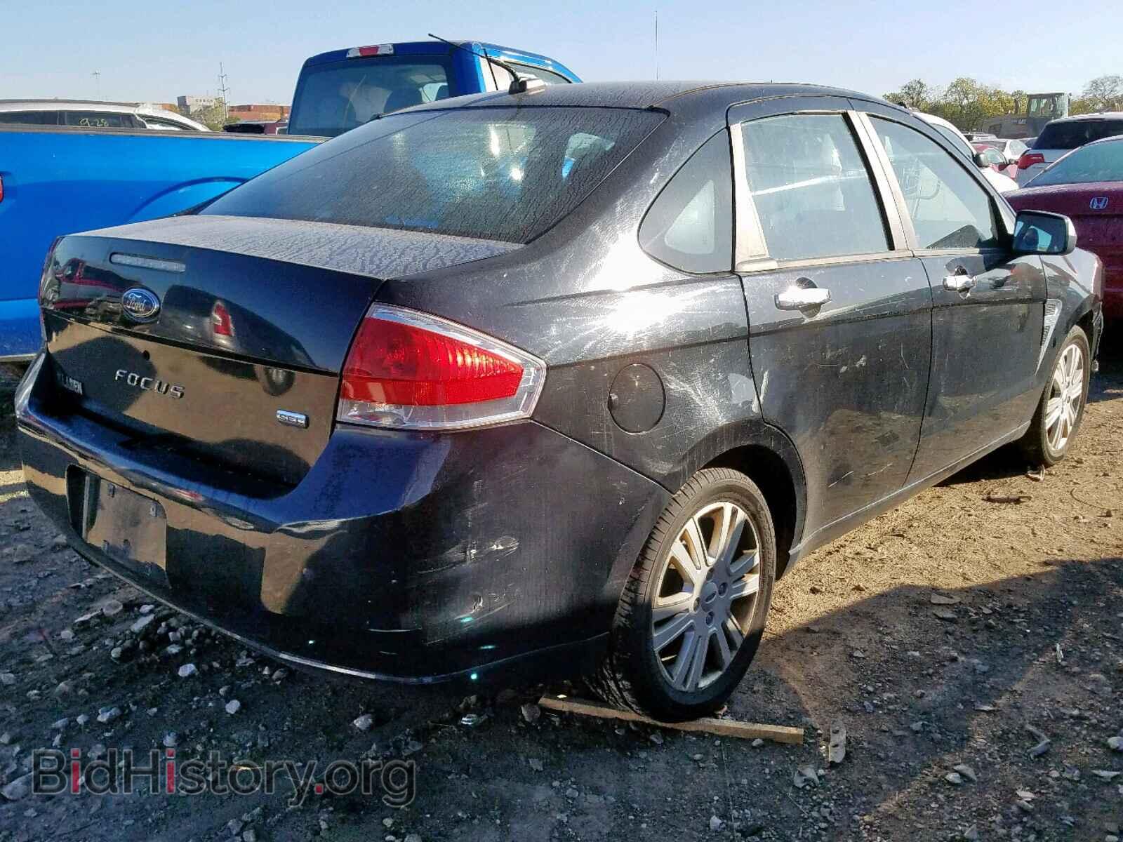 2009 FORD FOCUS - VIN: 1FAHP37N09W113349 - Photo 4