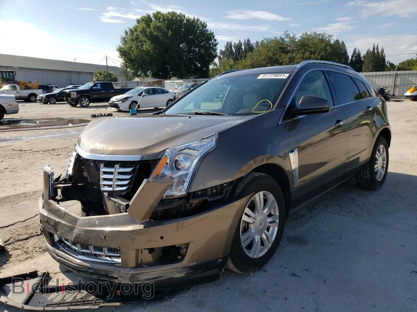 2014 CADILLAC SRX - VIN: 3GYFNEE30ES585359 - Фото 2