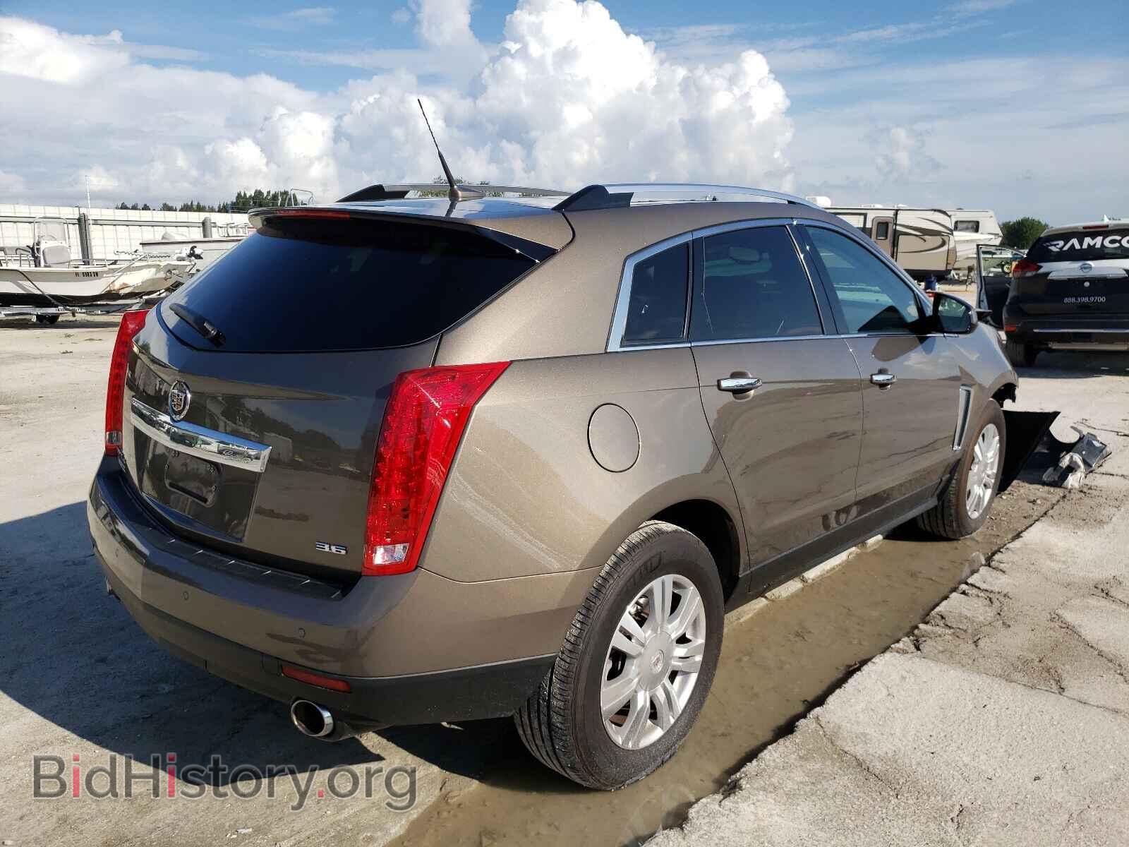 2014 CADILLAC SRX - VIN: 3GYFNEE30ES585359 - Фото 4