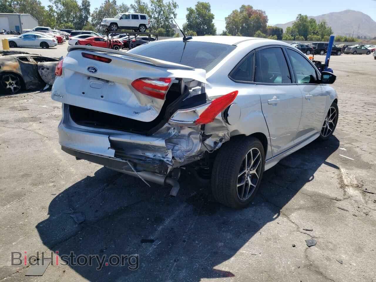 2016 FORD FOCUS - VIN: 1FADP3F27GL301595 - Photo 4