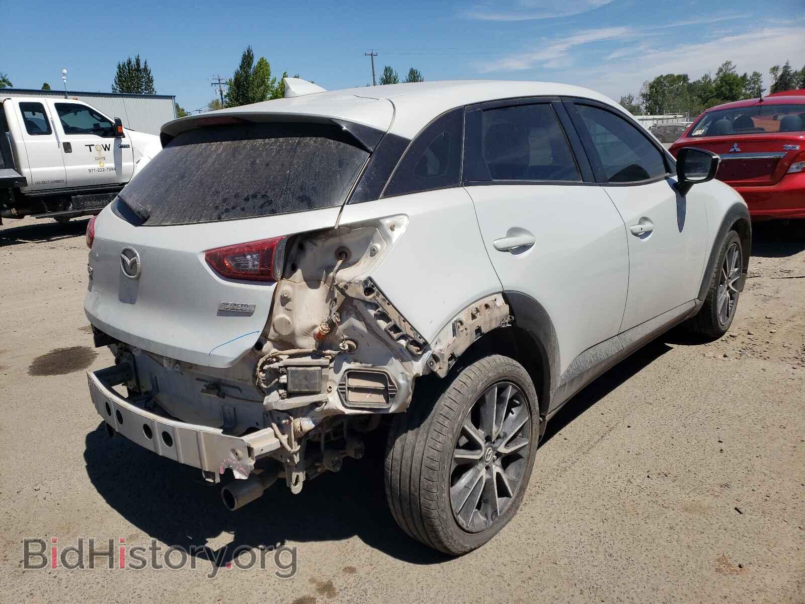 2018 MAZDA CX-3 - VIN: JM1DKFC76J0310873 - Фото 4