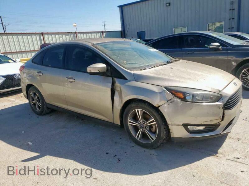 2017 Ford FOCUS (VIN 1FADP3FE5HL289975) — photo 4 of 13