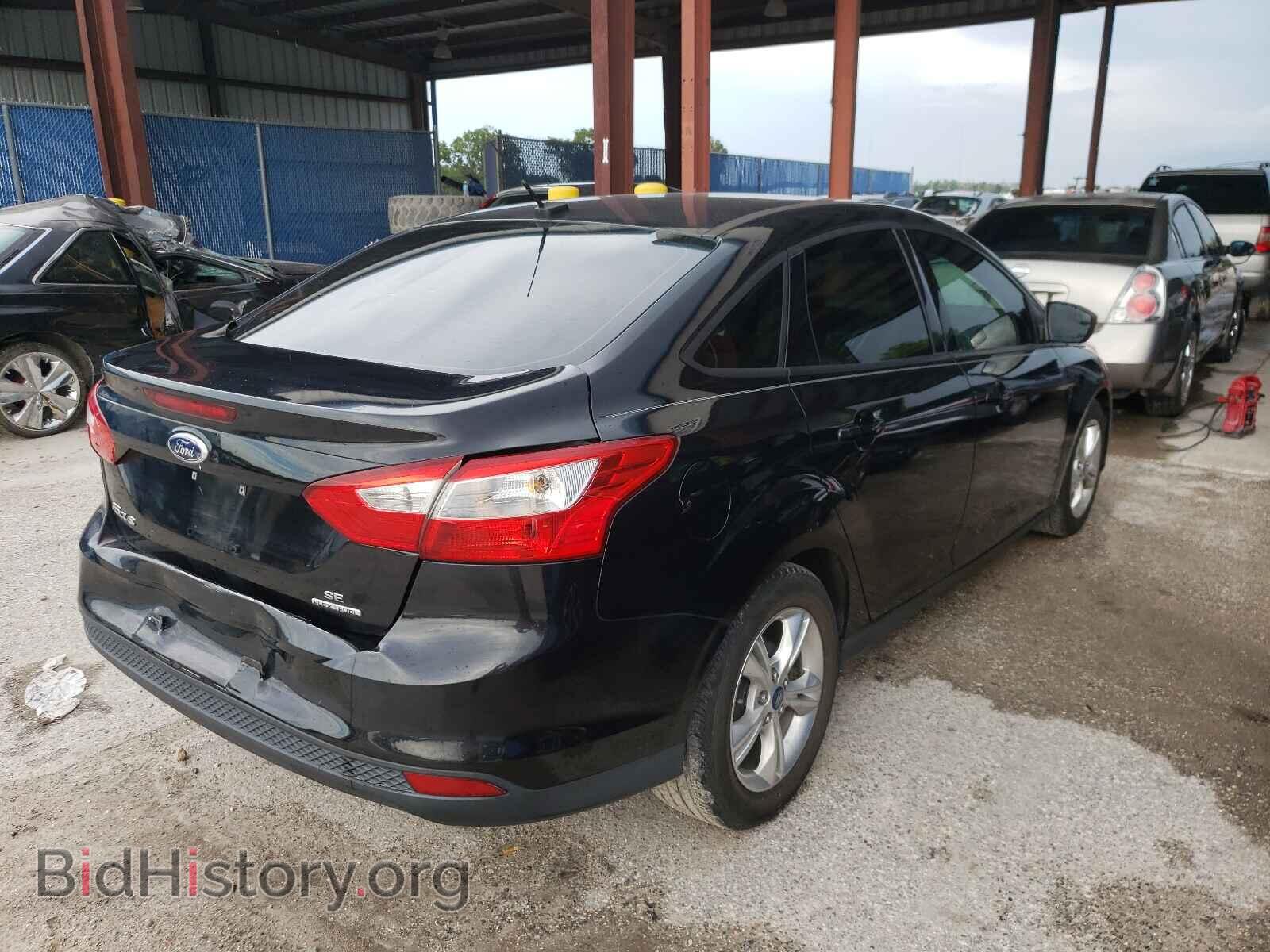 2014 FORD FOCUS - VIN: 1FADP3F25EL104230 - Photo 4