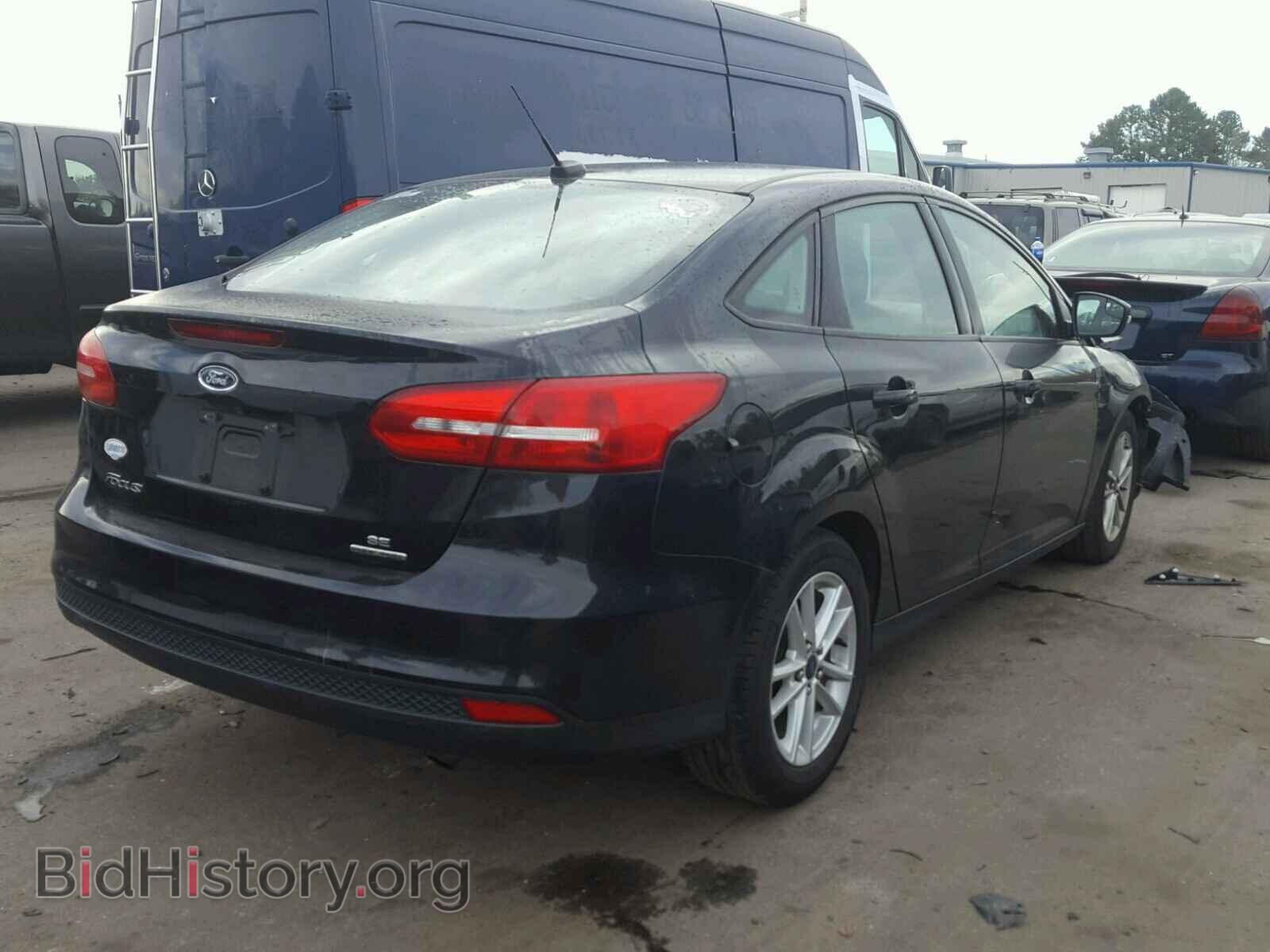 2015 FORD FOCUS - VIN: 1FADP3F2XFL252391 - Photo 4