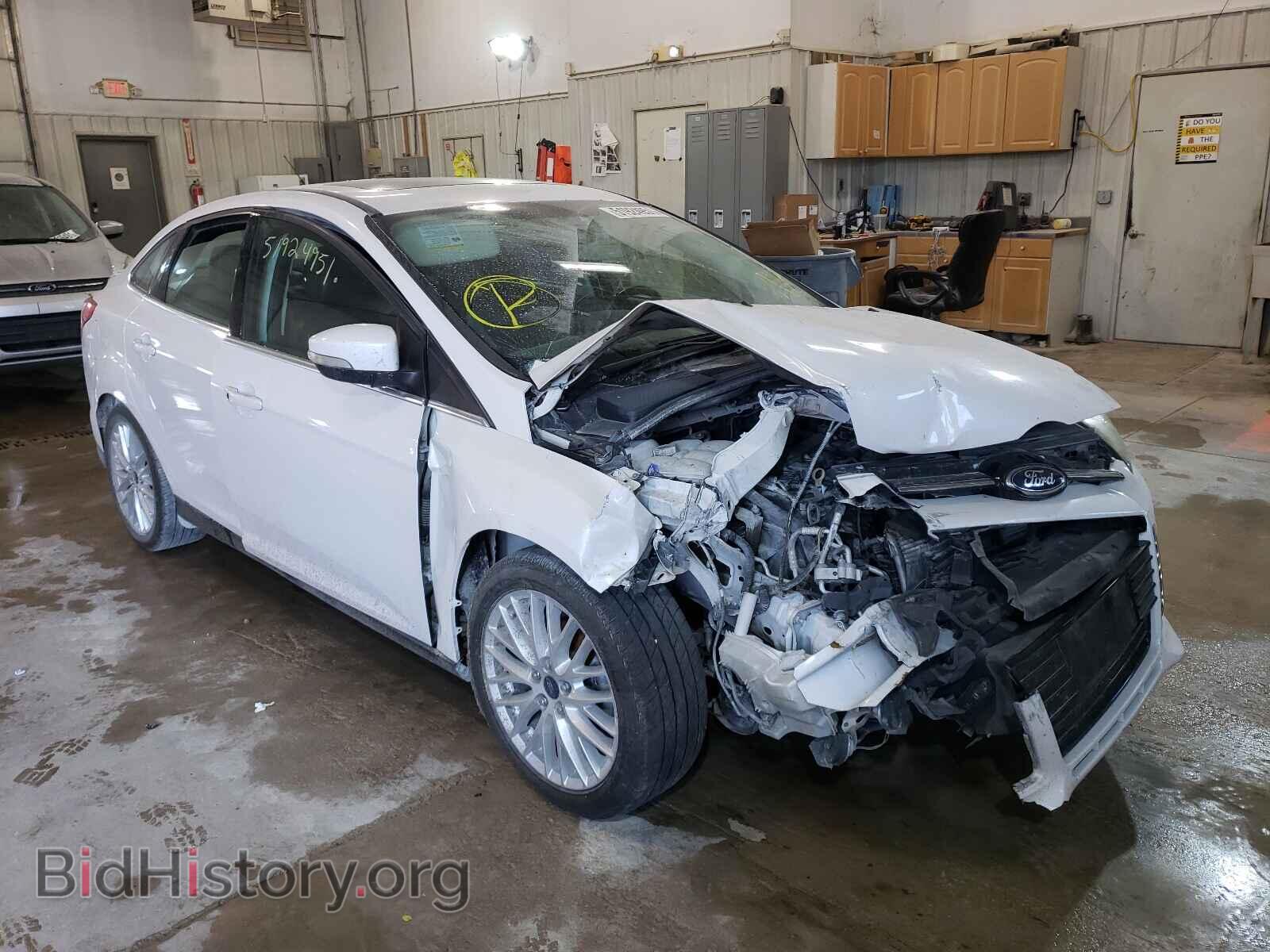 Фотография 1FADP3J28EL161819 - FORD FOCUS 2014