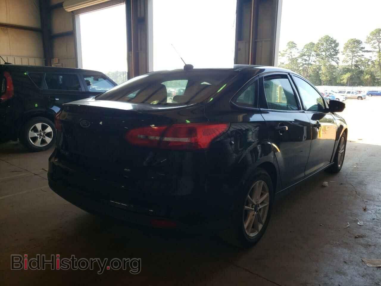 2015 FORD FOCUS - VIN: 1FADP3F21FL327446 - Photo 4