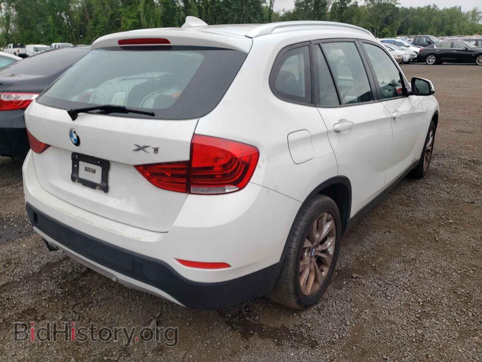 2014 BMW X1 - VIN: WBAVL1C58EVY10039 - Фото 4