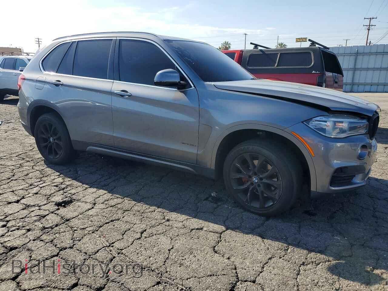 2014 BMW X5 - VIN: 5UXKR2C57E0C00447 - Фото 4