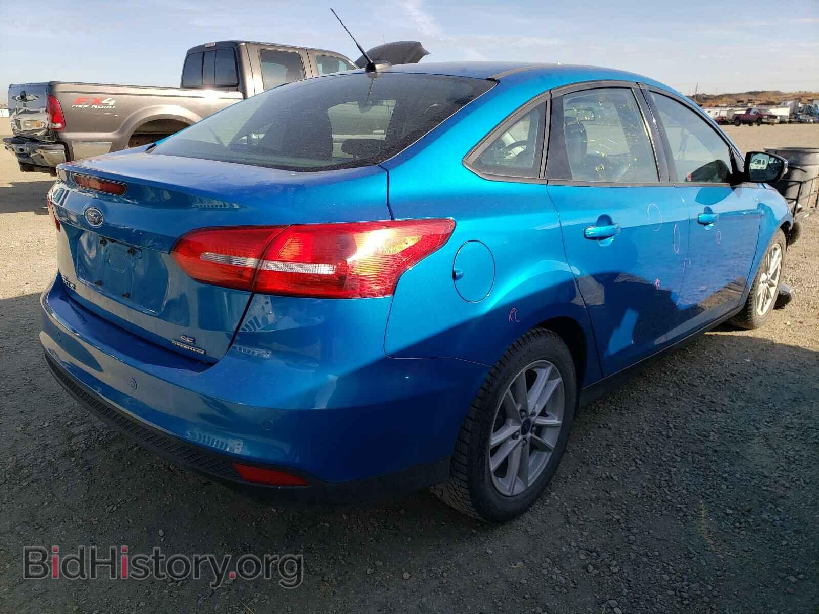 2015 FORD FOCUS - VIN: 1FADP3F21FL332064 - Photo 4