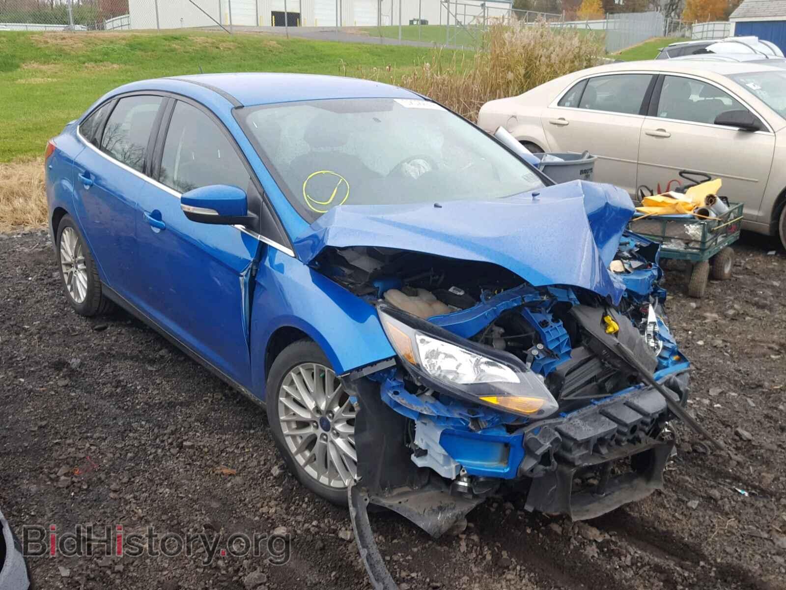 Фотография 1FADP3J25EL275079 - FORD FOCUS 2014