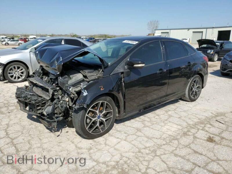 2015 Ford FOCUS SE (VIN 1FADP3F20FL385225) — photo 1 of 14, Copart, damage: front end