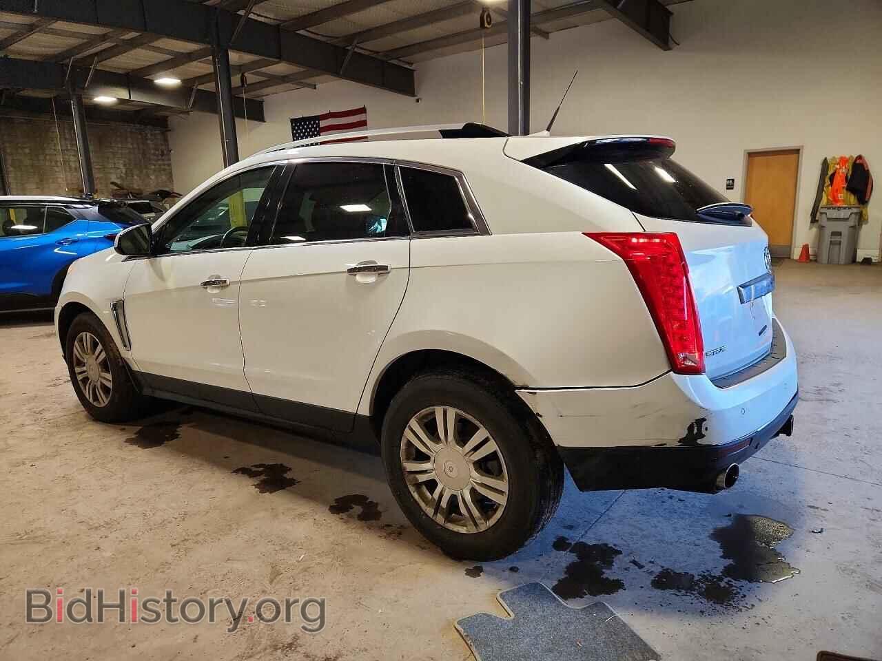 2013 CADILLAC SRX - VIN: 3GYFNCE34DS641466 - Фото 2