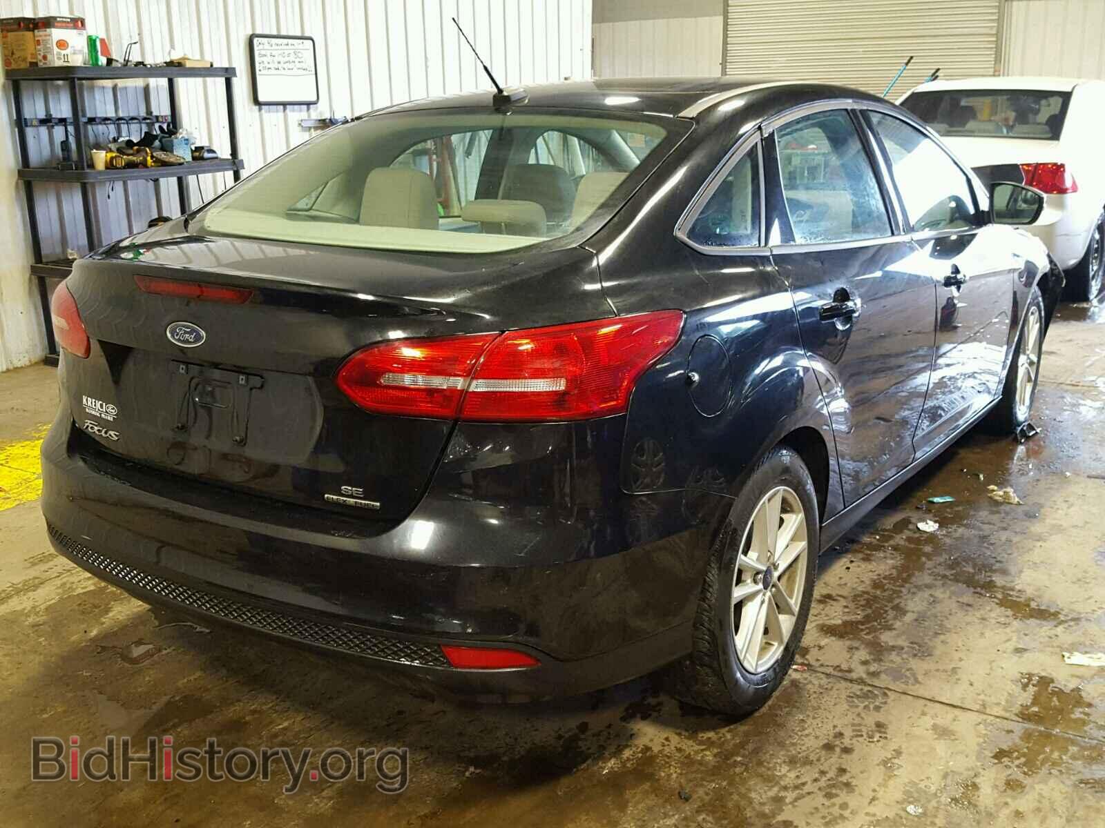 2015 FORD FOCUS - VIN: 1FADP3F22FL220809 - Photo 4