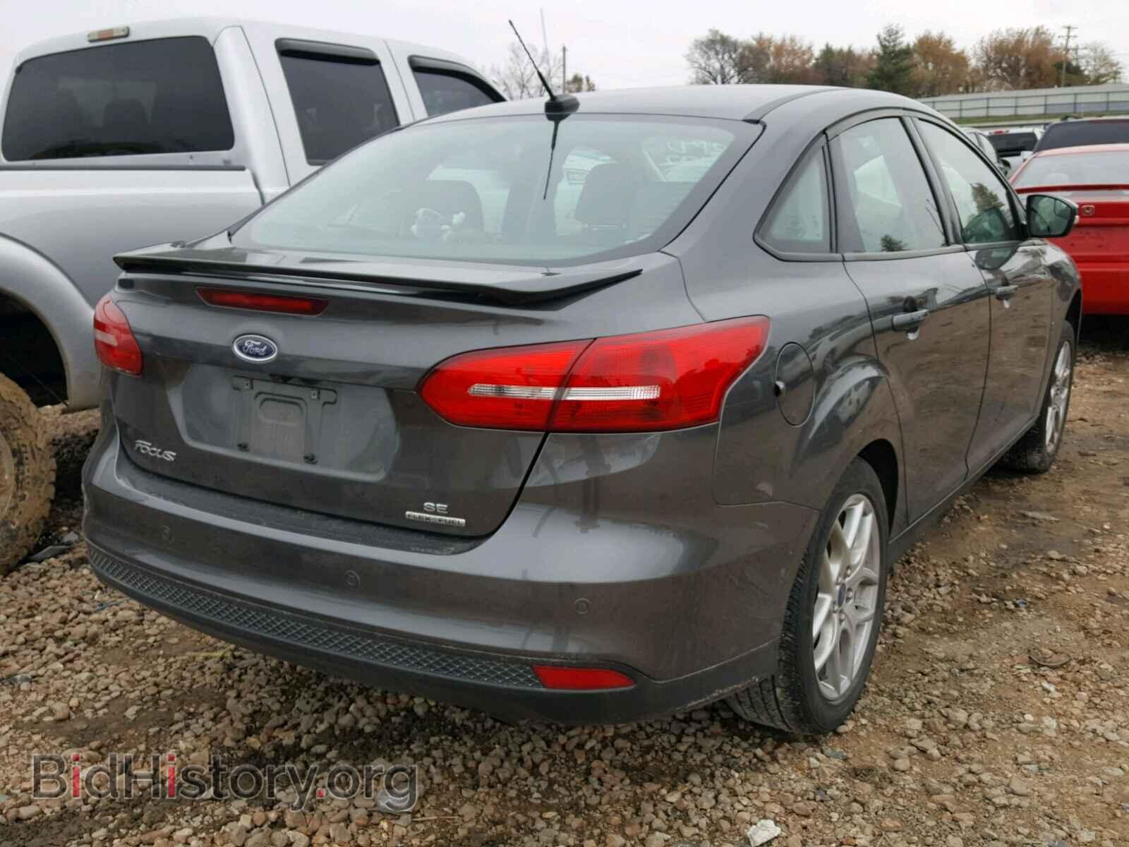 2015 FORD FOCUS - VIN: 1FADP3F2XFL323878 - Photo 4