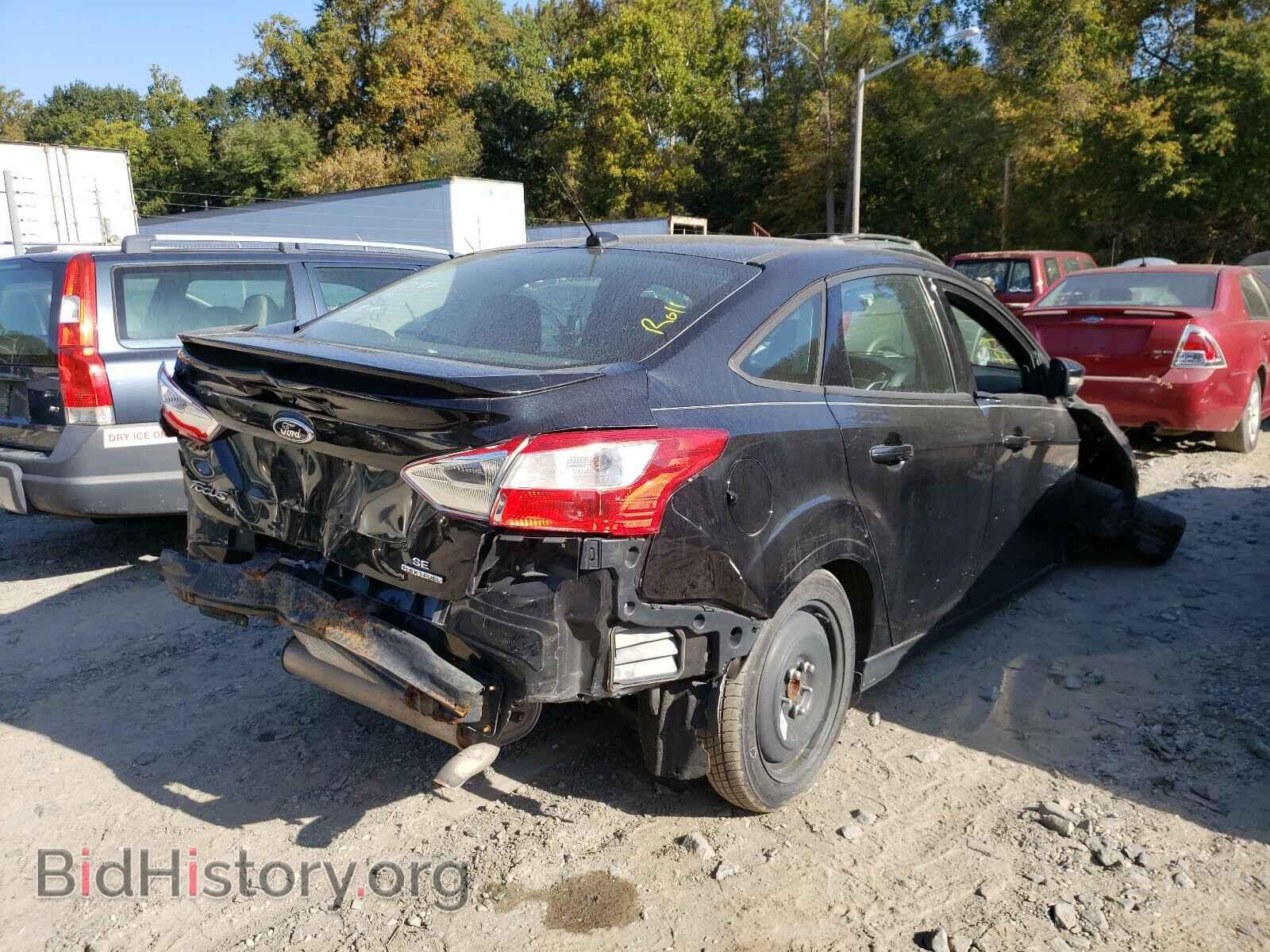 2013 FORD FOCUS - VIN: 1FADP3F21DL302320 - Photo 4