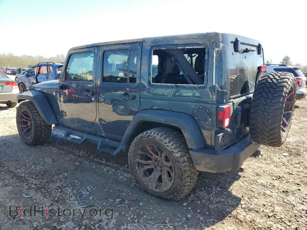 2016 JEEP All Models - VIN: 1C4HJWFG1GL348034 - Photo 2