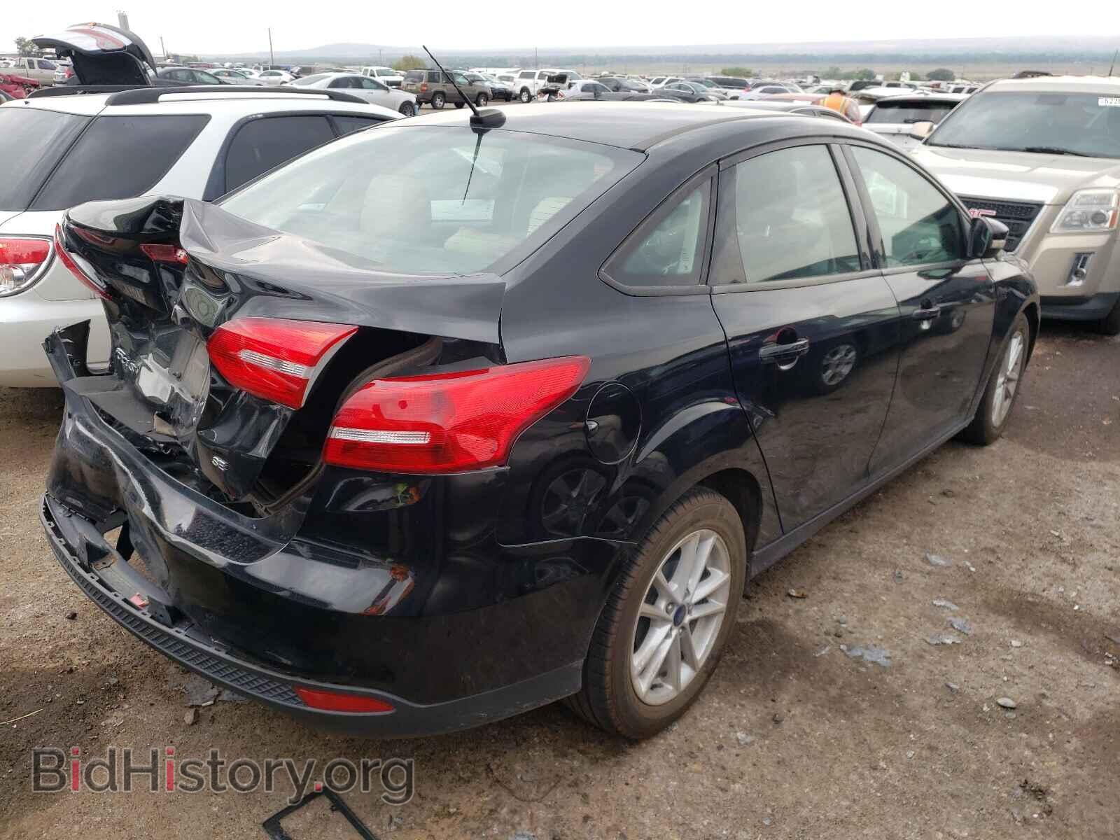 2017 FORD FOCUS - VIN: 1FADP3F26HL328983 - Photo 4