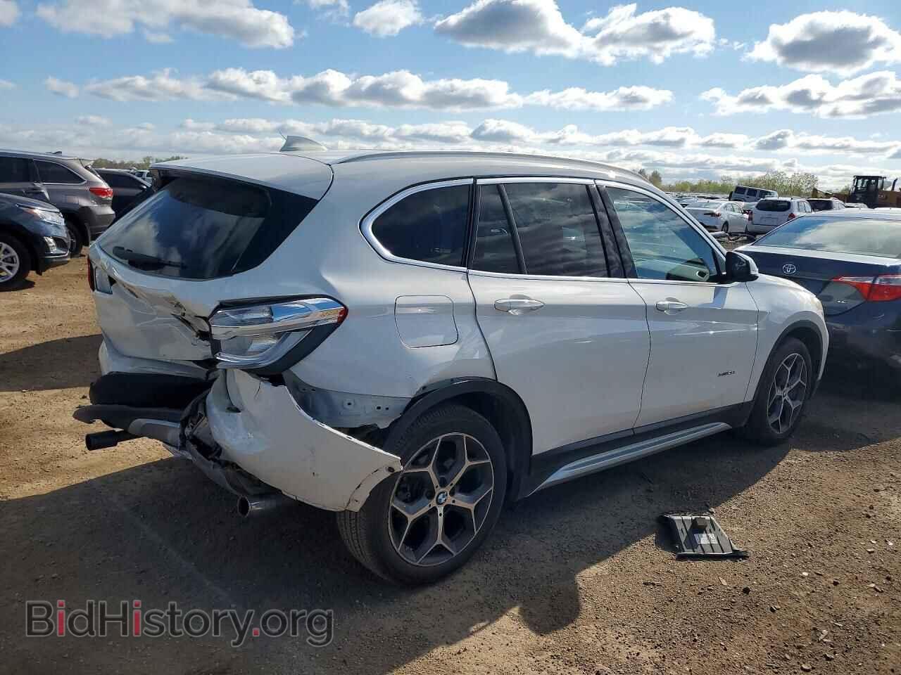 2016 BMW X1 - VIN: WBXHT3C30GP882356 - Фото 3