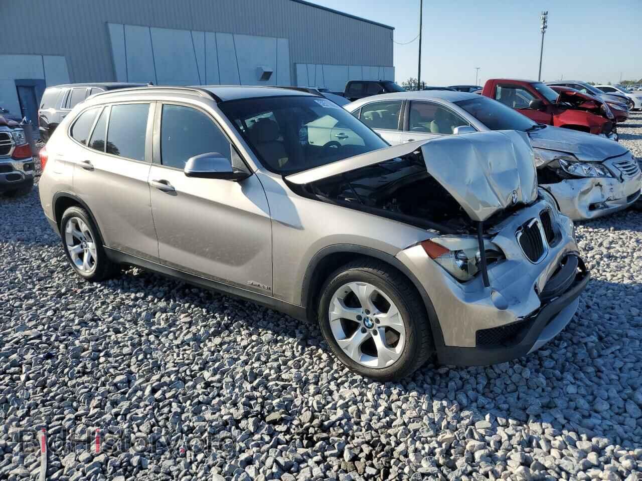 2014 BMW X1 - VIN: WBAVM1C57EVW50748 - Фото 4