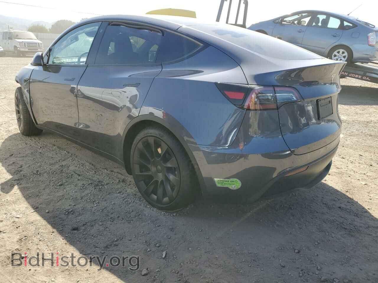 2023 TESLA MODEL Y - VIN: 7SAYGAEE9PF709971 - Photo 2