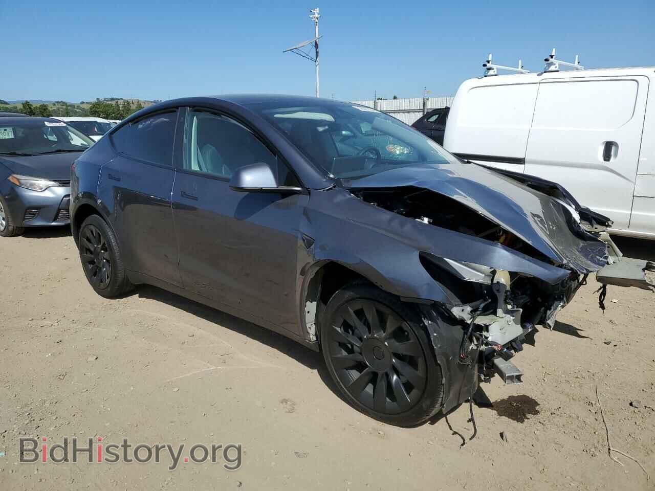 2023 TESLA MODEL Y - VIN: 7SAYGAEE9PF709971 - Photo 4
