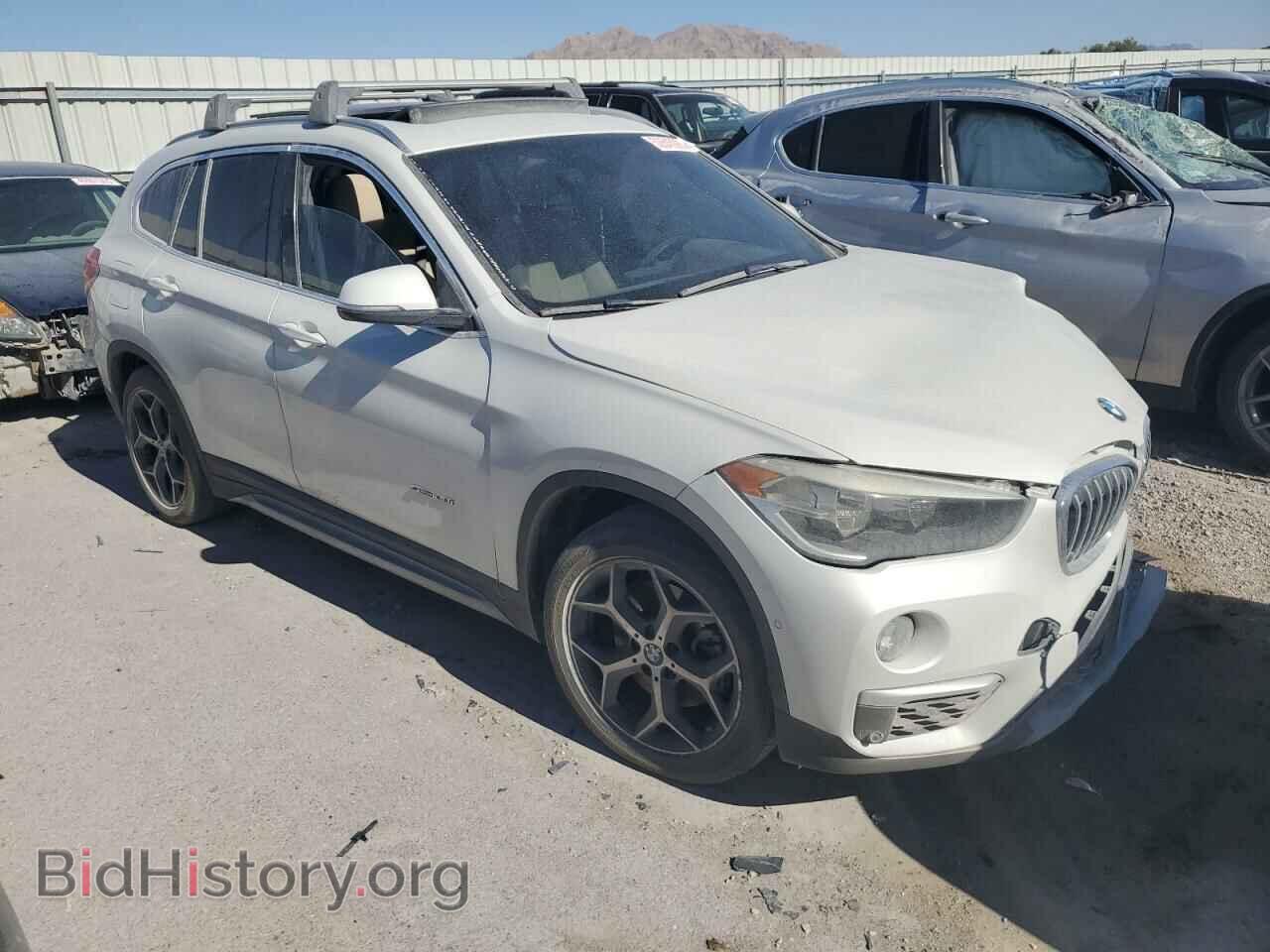 2017 BMW X1 - VIN: WBXHU7C30H5H33496 - Фото 4