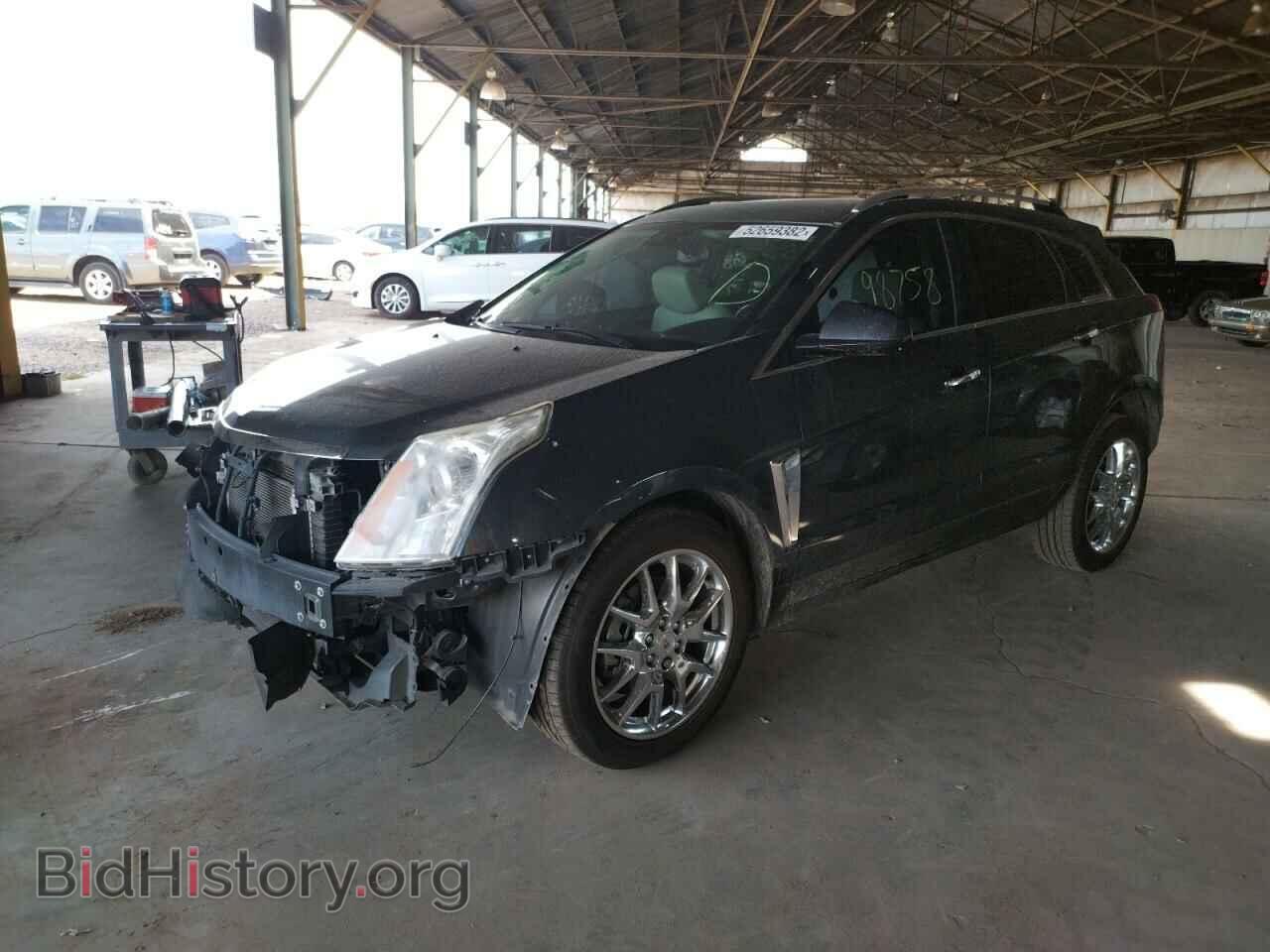 2014 CADILLAC SRX - VIN: 3GYFNDE35ES592236 - Фото 2