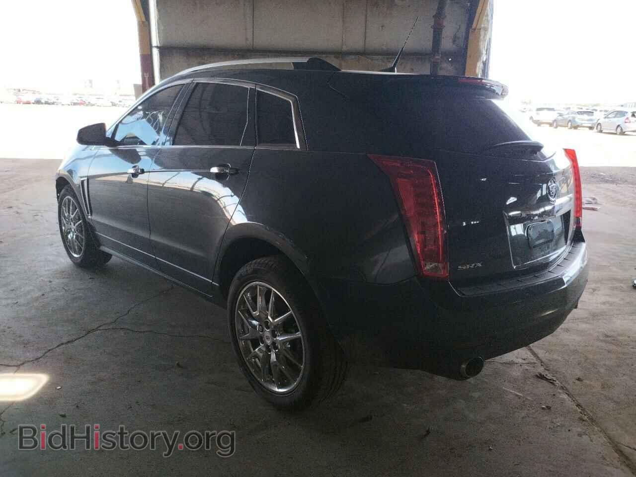 2014 CADILLAC SRX - VIN: 3GYFNDE35ES592236 - Фото 3