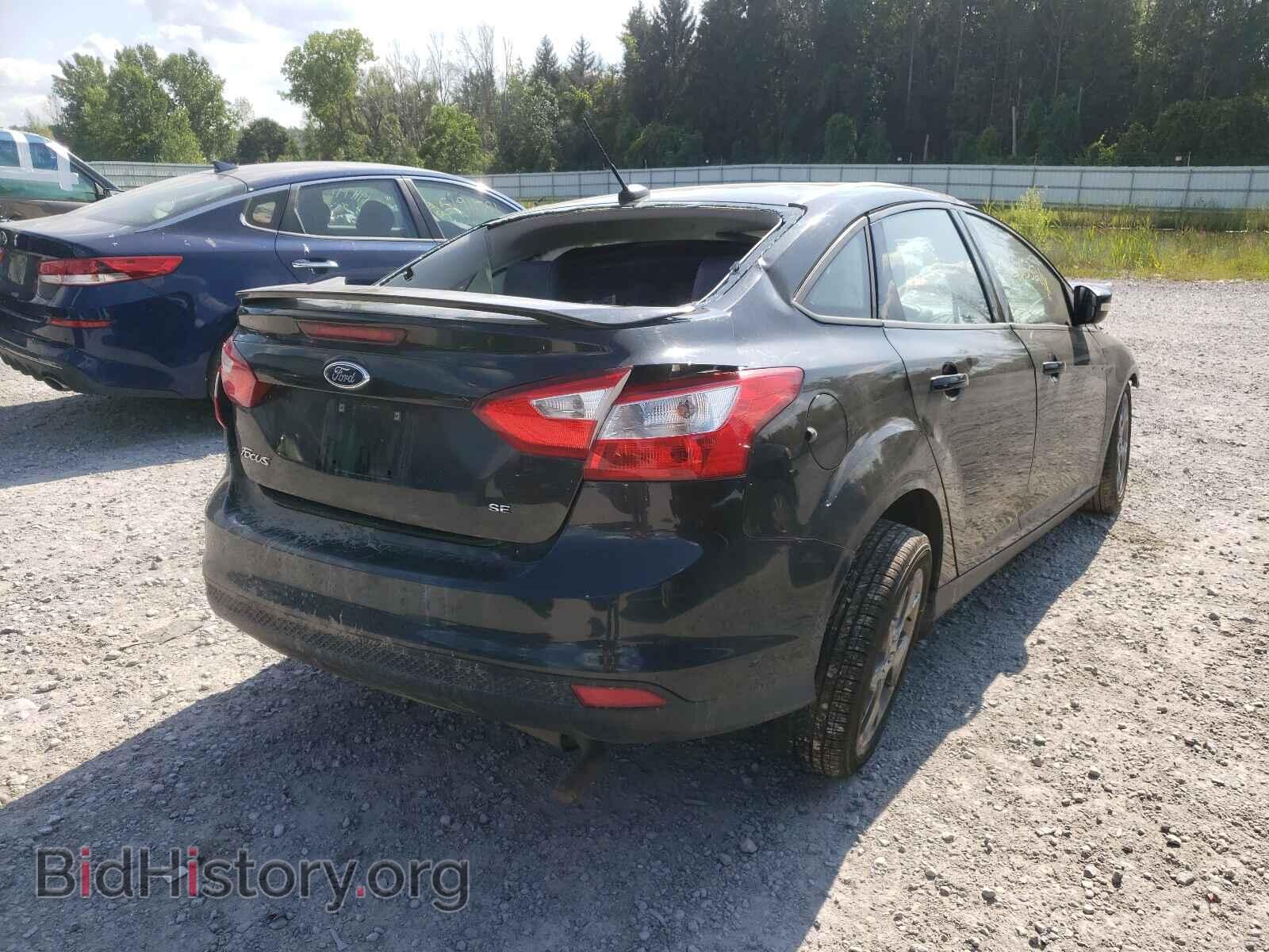 2014 FORD FOCUS - VIN: 1FADP3F21EL331088 - Photo 4
