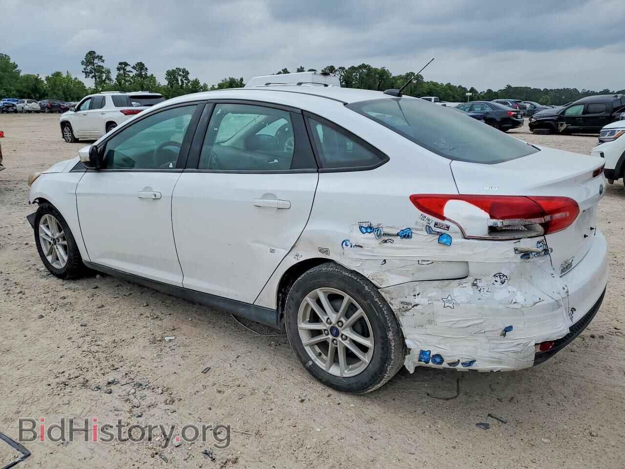 2016 FORD FOCUS - VIN: 1FADP3F22GL391545 - Фото 2