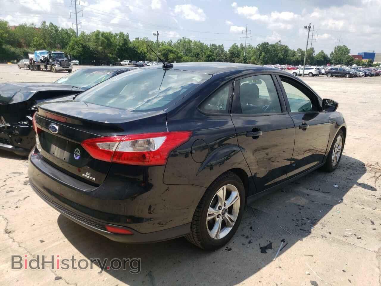 2014 FORD FOCUS - VIN: 1FADP3F22EL106954 - Photo 4