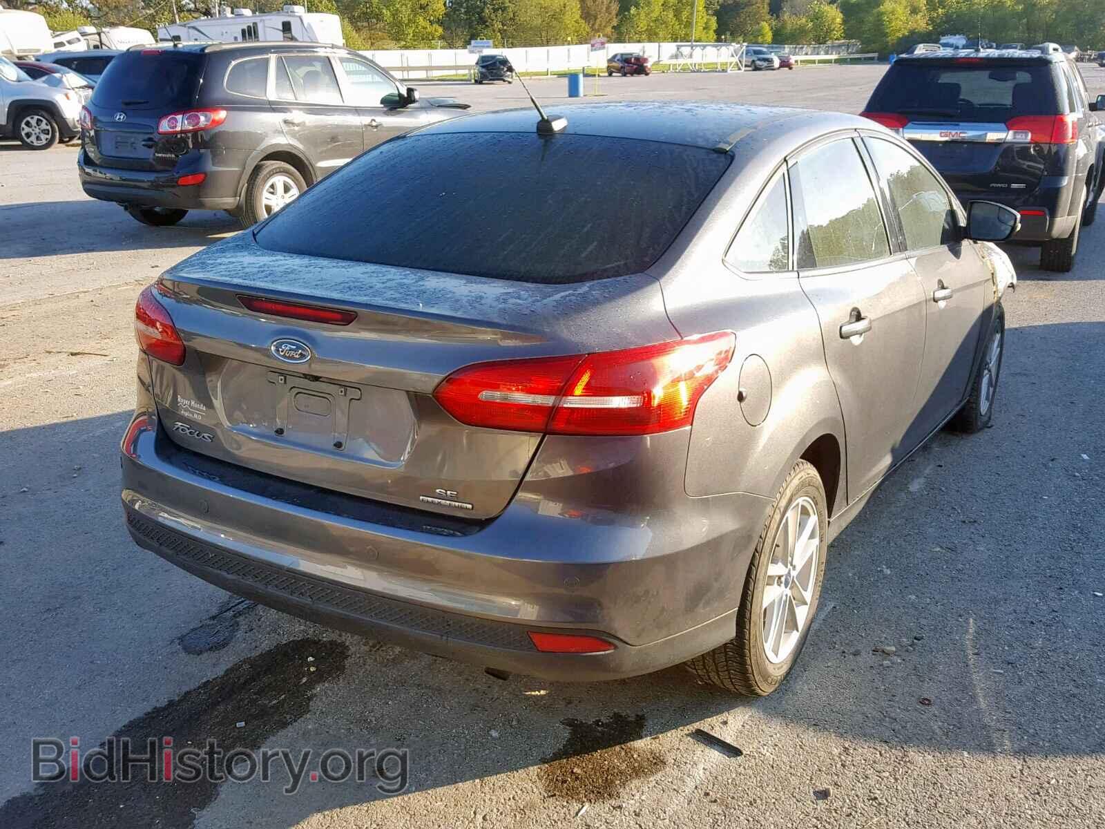 2015 FORD FOCUS - VIN: 1FADP3F25FL210713 - Photo 4