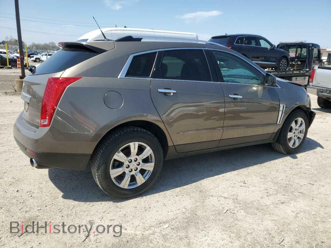 2014 CADILLAC SRX - VIN: 3GYFNEE35ES570341 - Фото 3