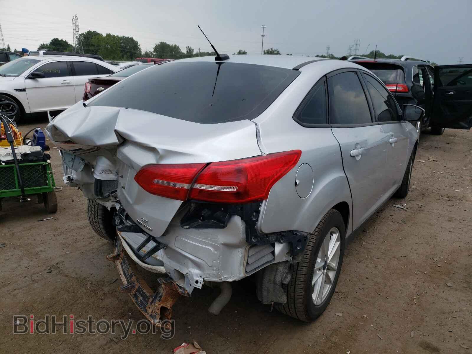 2016 FORD FOCUS - VIN: 1FADP3F24GL386945 - Фото 4