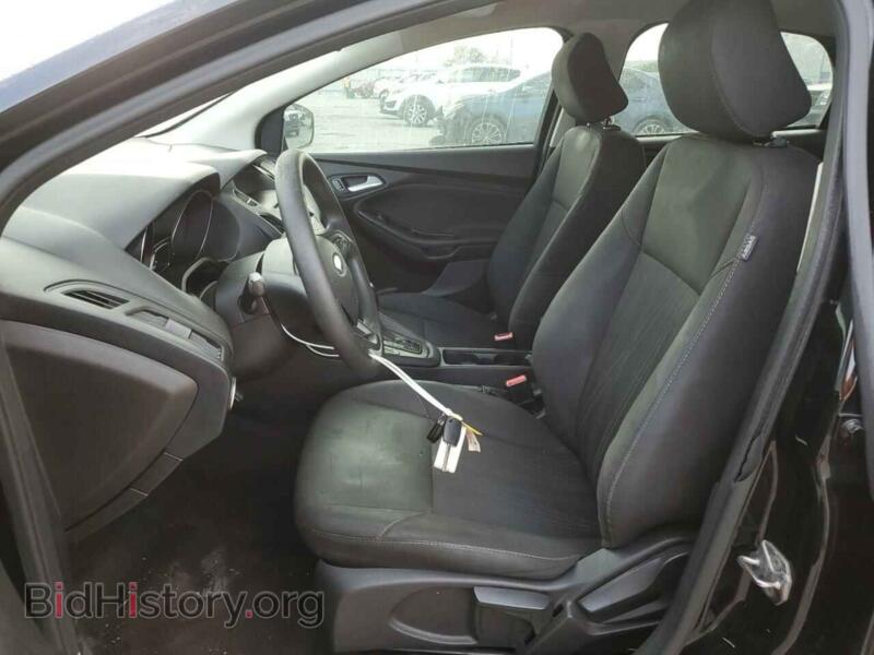 2016 Ford FOCUS (VIN 1FADP3F21GL285958) — photo 7 of 12