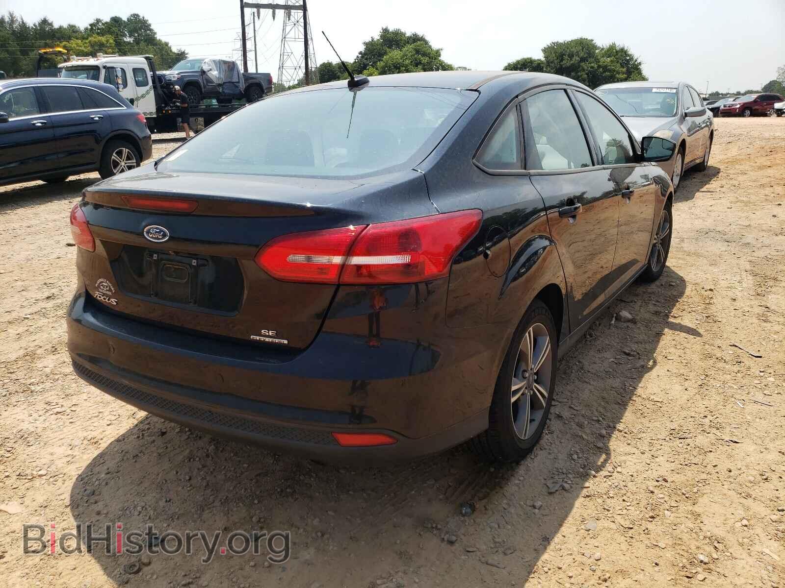 2016 FORD FOCUS - VIN: 1FADP3F2XGL391468 - Photo 4
