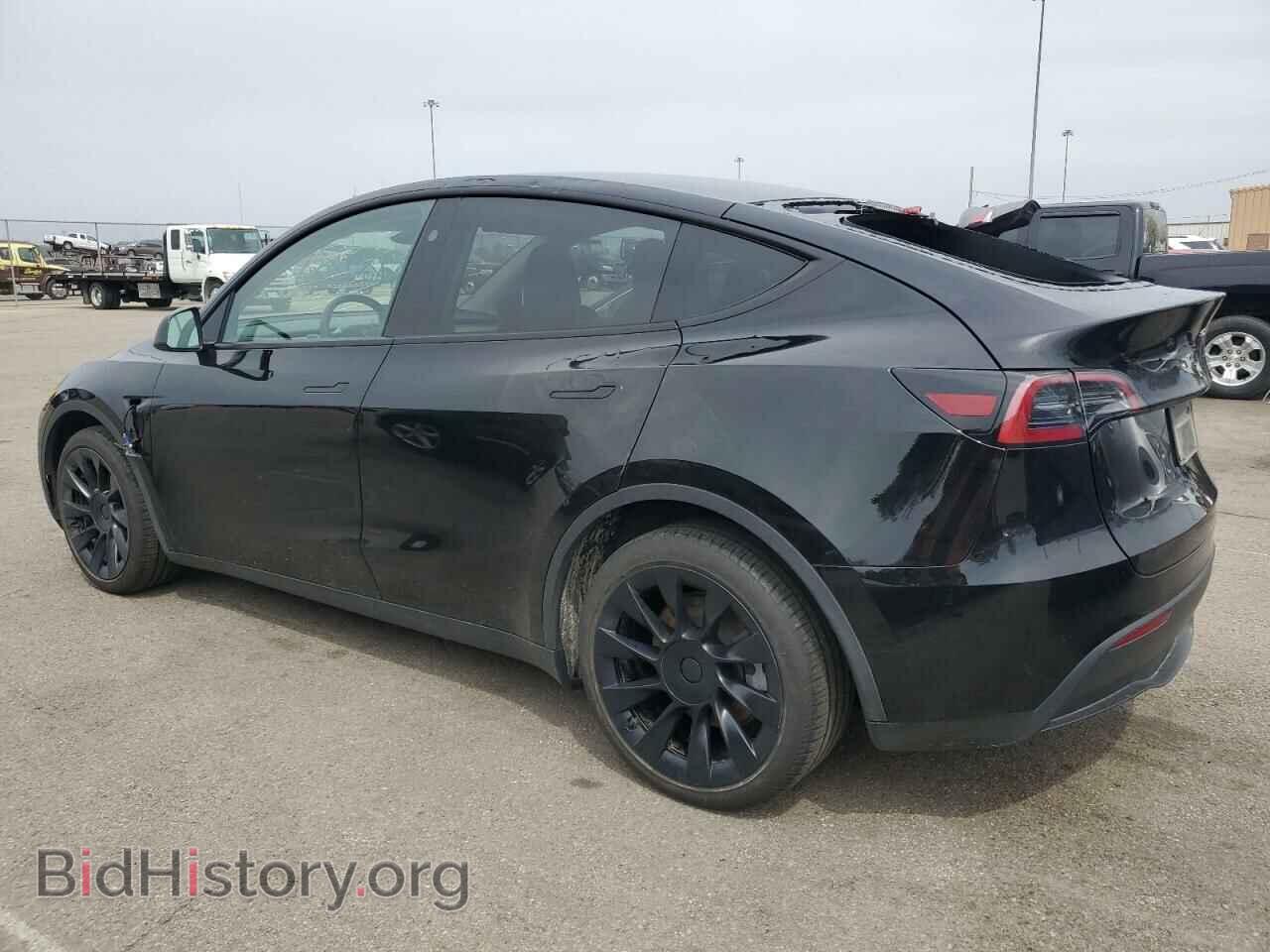 2023 TESLA MODEL Y - VIN: 7SAYGDEE0PF869710 - Фото 2