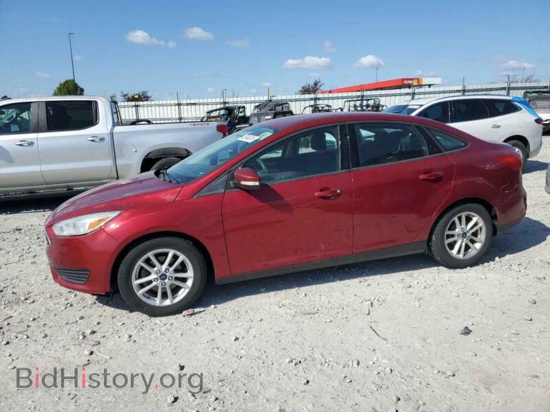 2015 Ford FOCUS SE (VIN 1FADP3F20FL383507) — фото 1 из 12, Copart, повреждение: бок