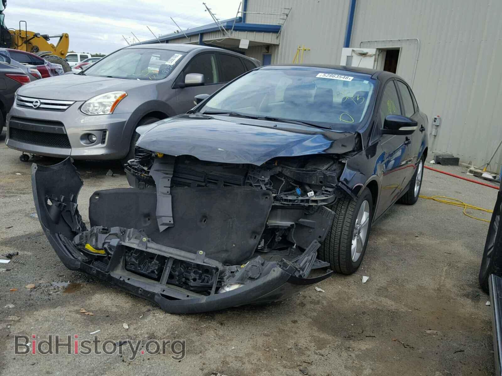 Фотография 1FADP3F29DL129601 - FORD FOCUS 2013